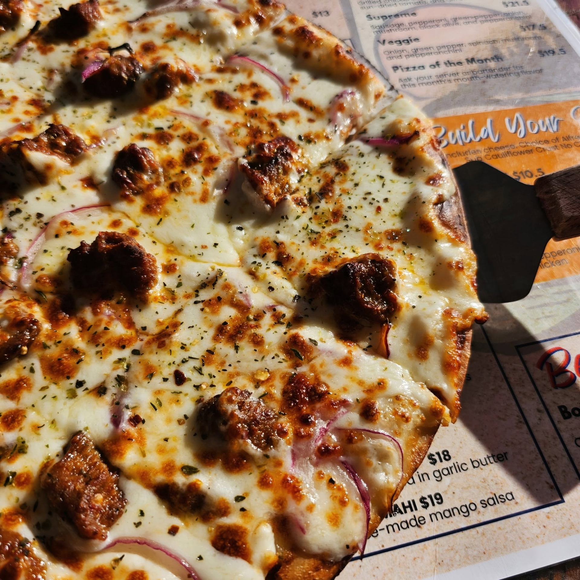 Sausage pizza fresh from the Sunset Bar & Grill kitchen